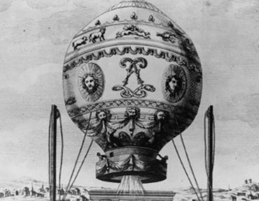 A historical picture of a highly decorated hot air balloon.