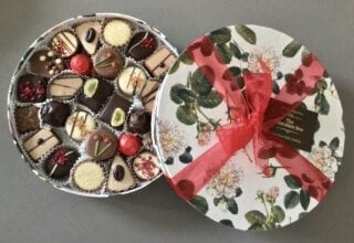 premium chocolate box with red ribbon
