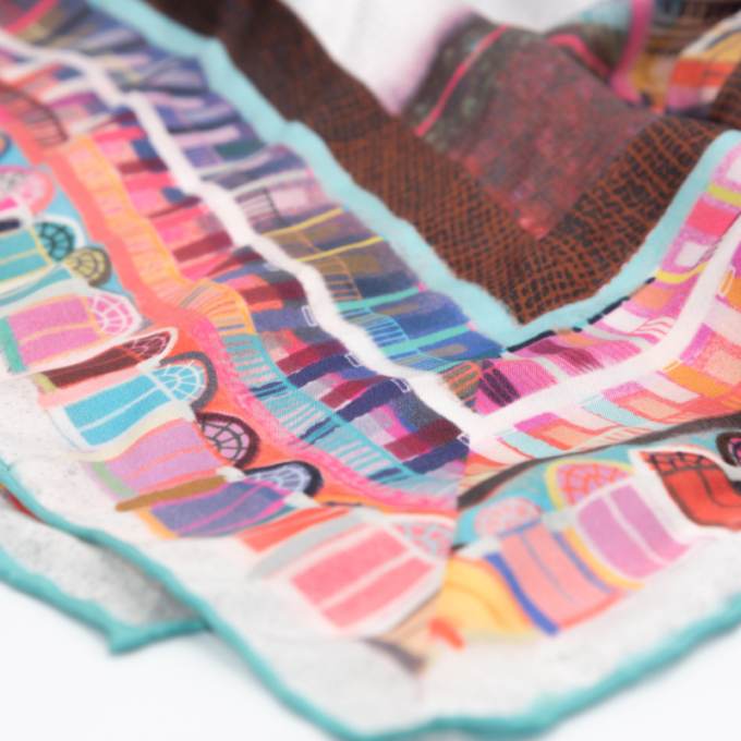 A multicoloured piece hall design on a silk scarf.